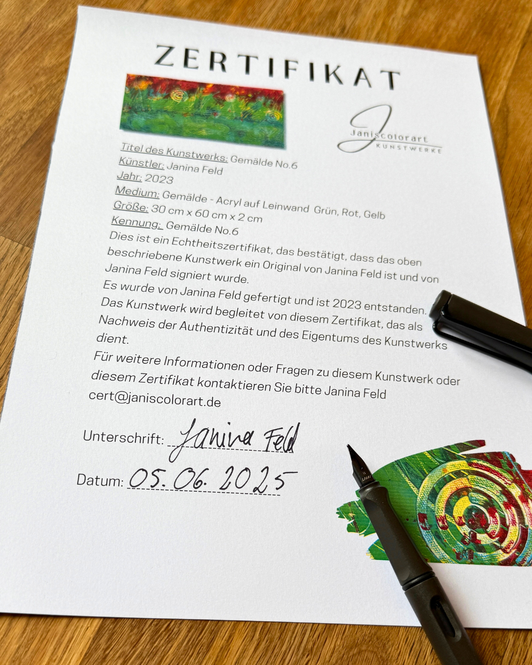 Zertifikat mit Unterschrift und Datum der Künstlerin Janiscolorart.